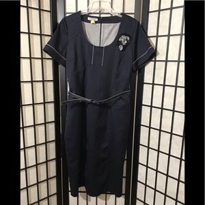 Xmeric Wm Navy and Lined in Plaid with a Belt and Flower